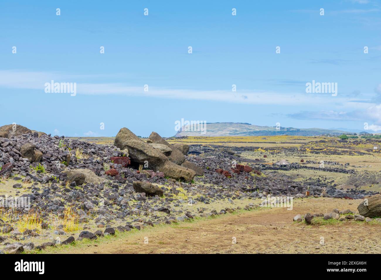 Fallen toppled moai (statues) on the ruined platform at Ahu Akahanga on