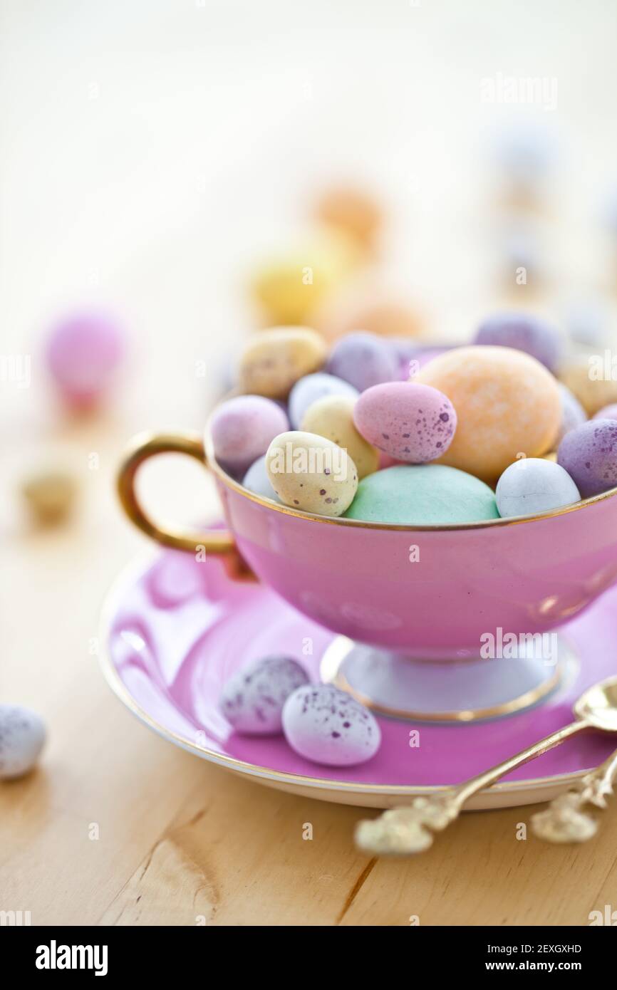 Colourful easter eggs in cup Stock Photo Alamy