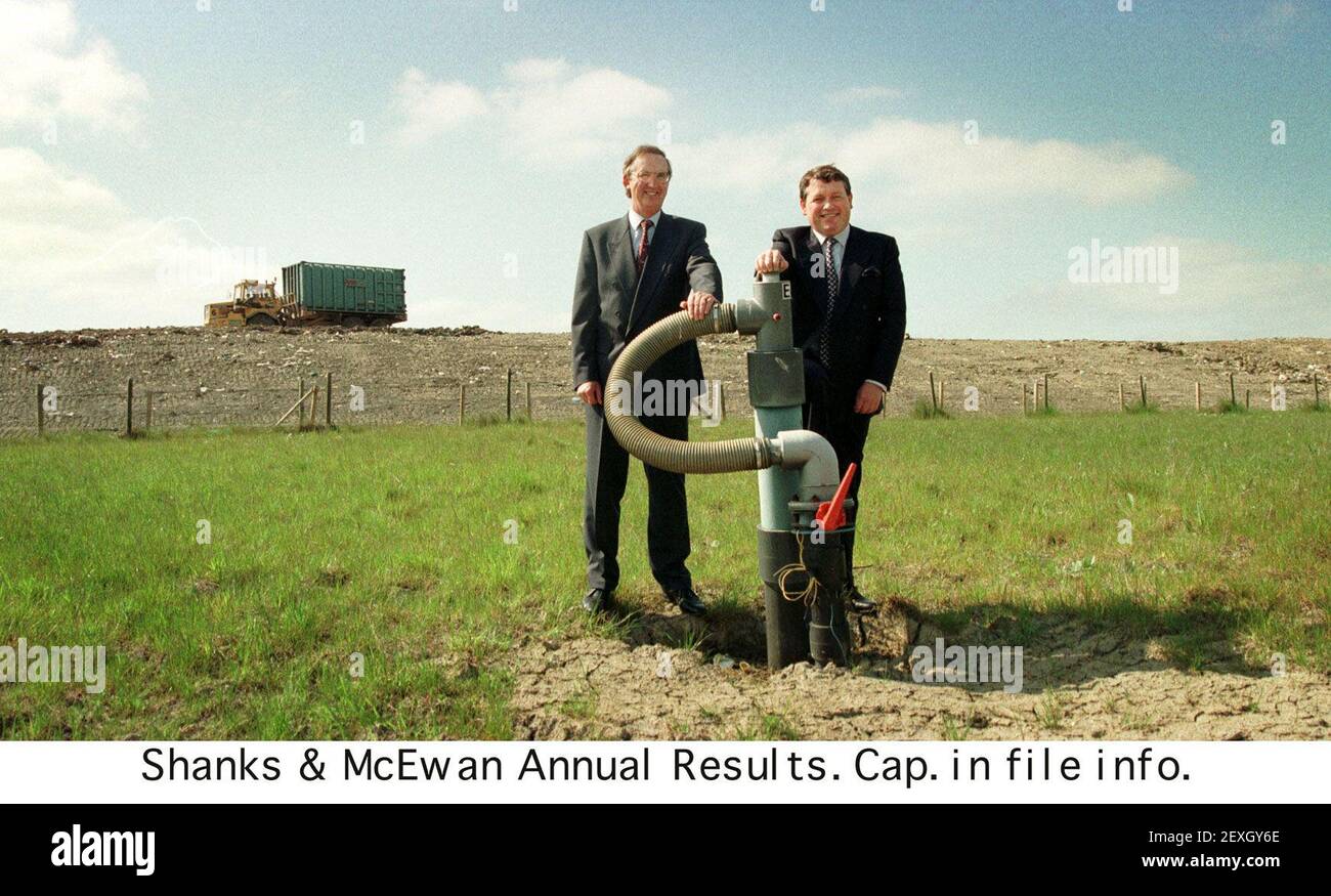 Michael Averill Chief Executive of the Shanks & McEwan Group on right and Group Finance Director David Downes left by a landfill gas collection point on ground restored by landfill the company's site at Calvert Bucks which currently takes waste by rail from West London and Avon districts Stock Photo