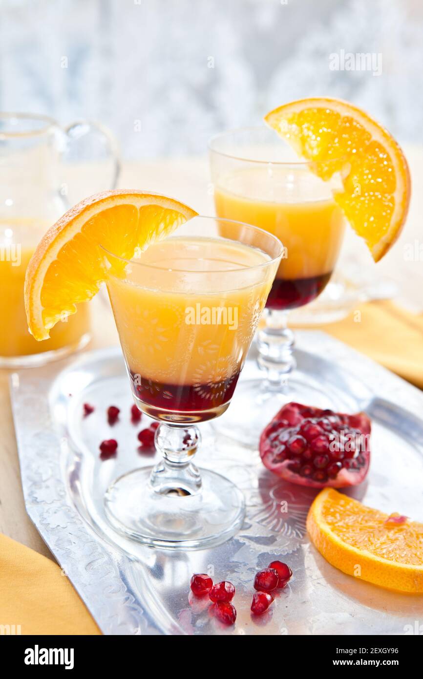 Orange juice with grenadine Stock Photo