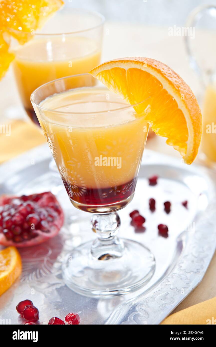 Orange juice with grenadine Stock Photo