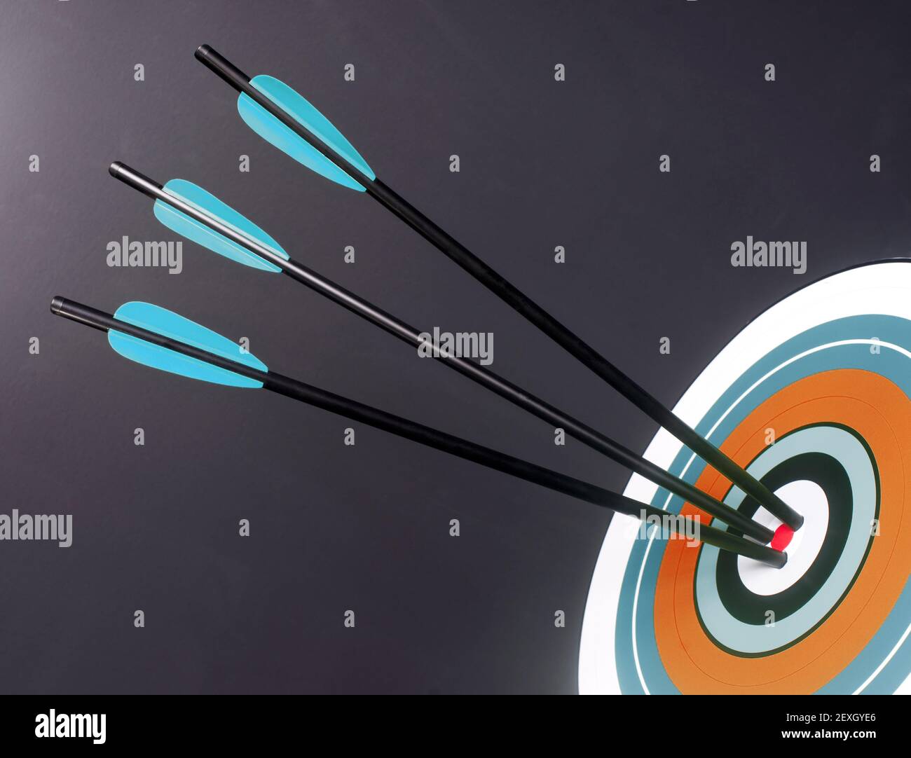 Three Blue Black Archery Arrows Hit Round Target Bullseye Center Stock