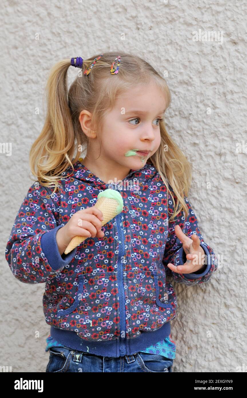 Cute little girl with ice cream Stock Photo