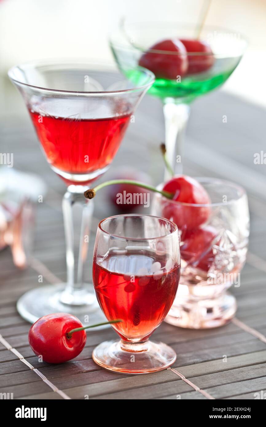 Cherry liqueur in small glasses Stock Photo Alamy