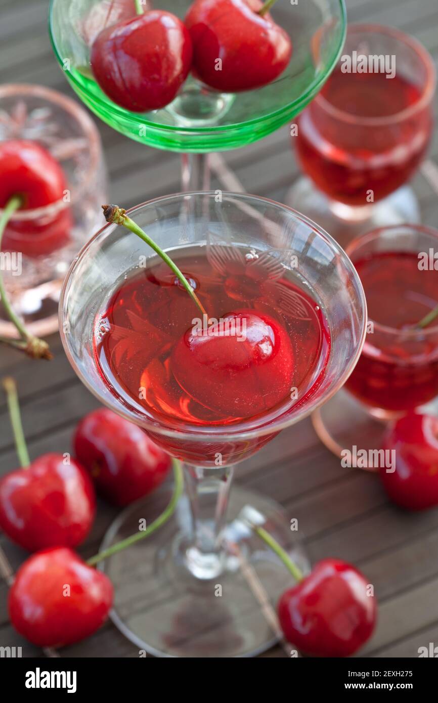 Cherry liqueur in small glasses Stock Photo