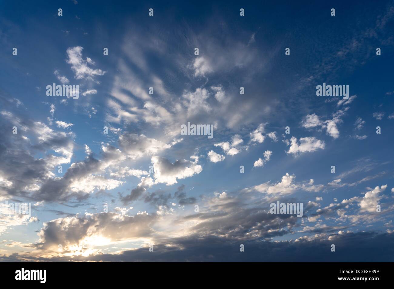 Stock photo of amazing sunset in cloudy sky Stock Photo - Alamy