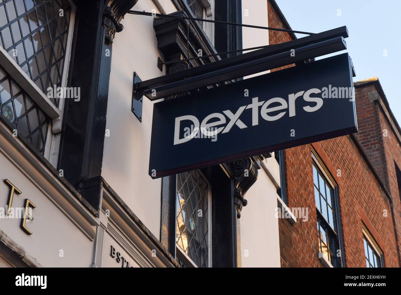 London, UK. 26th Feb, 2021. Dexters estate agent logo sign seen at one