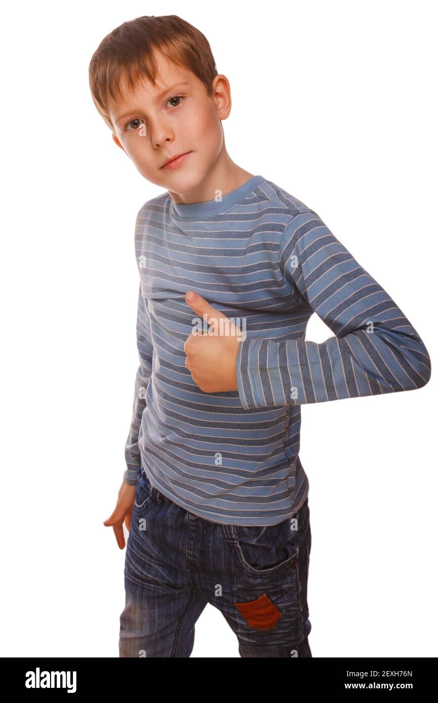 Blonde boy kid in striped jacket holding thumbs up, showing sign Stock Photo