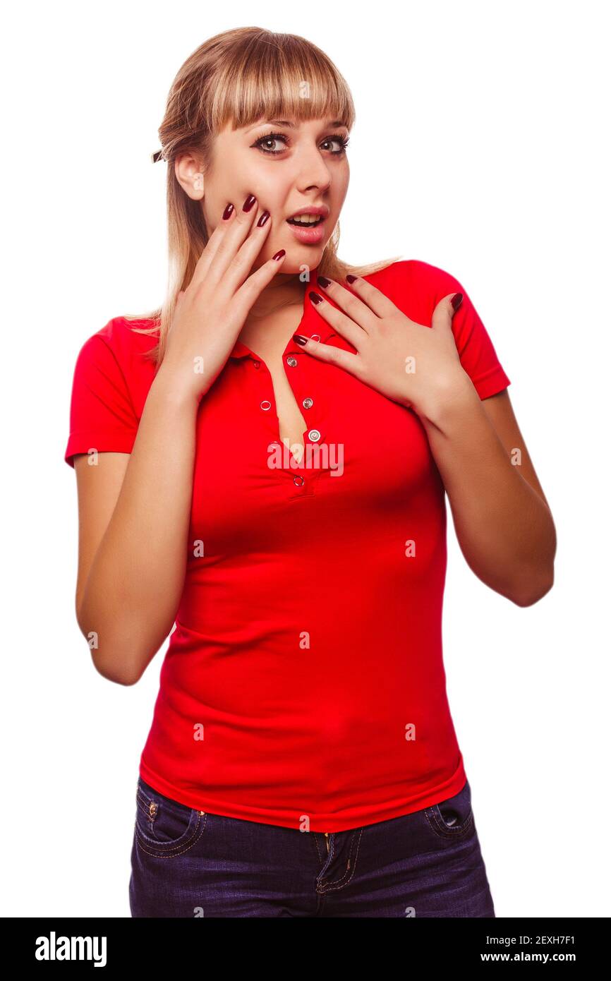Young girl beautiful woman face surprised surprise in a red shir Stock Photo