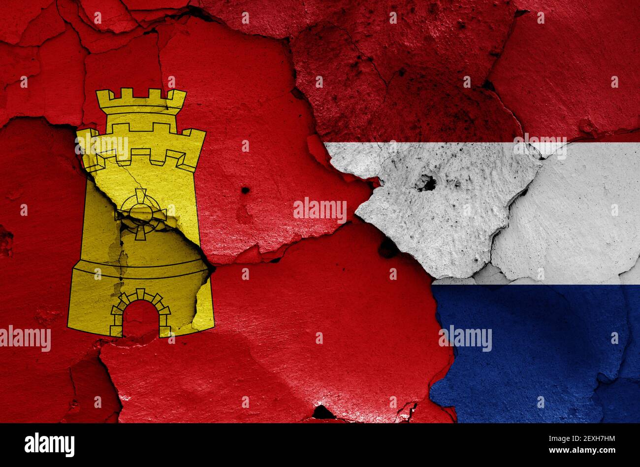 flags of Middelburg and Netherlands painted on cracked wall Stock Photo