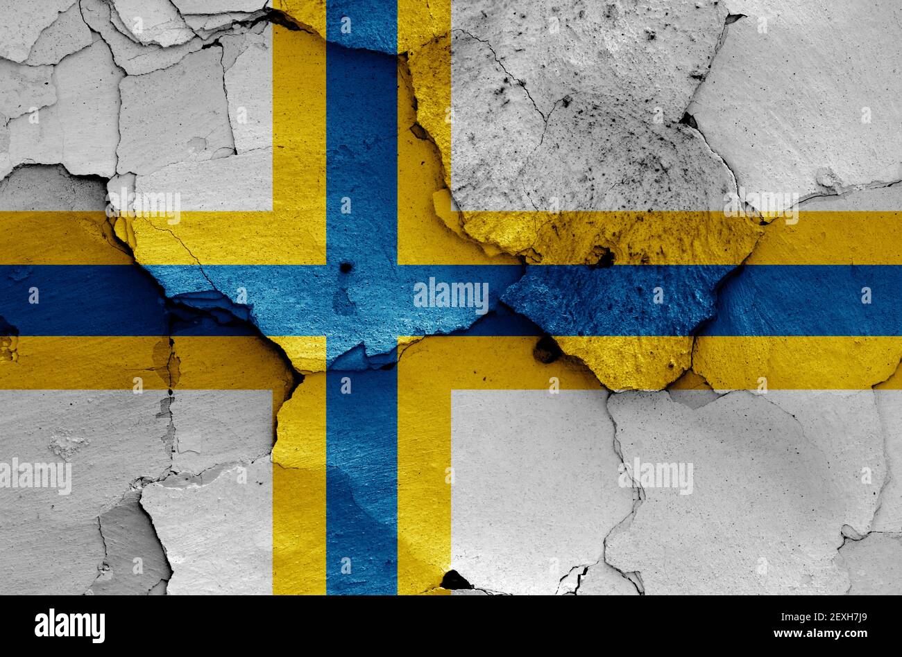 flag of Sweden Finns painted on cracked wall Stock Photo