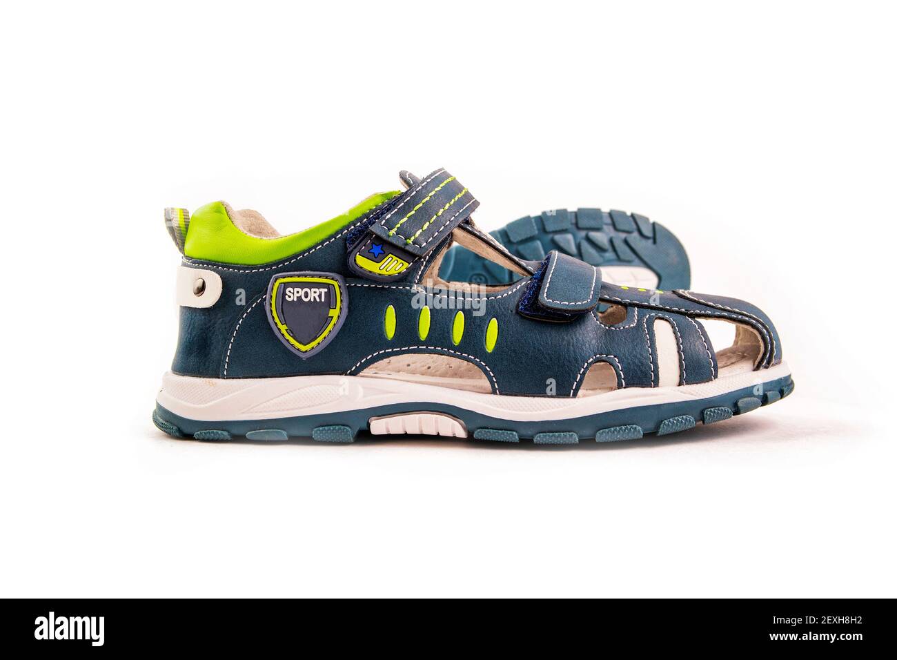a pair of children's blue green sandals with velcro fasteners. Stock Photo