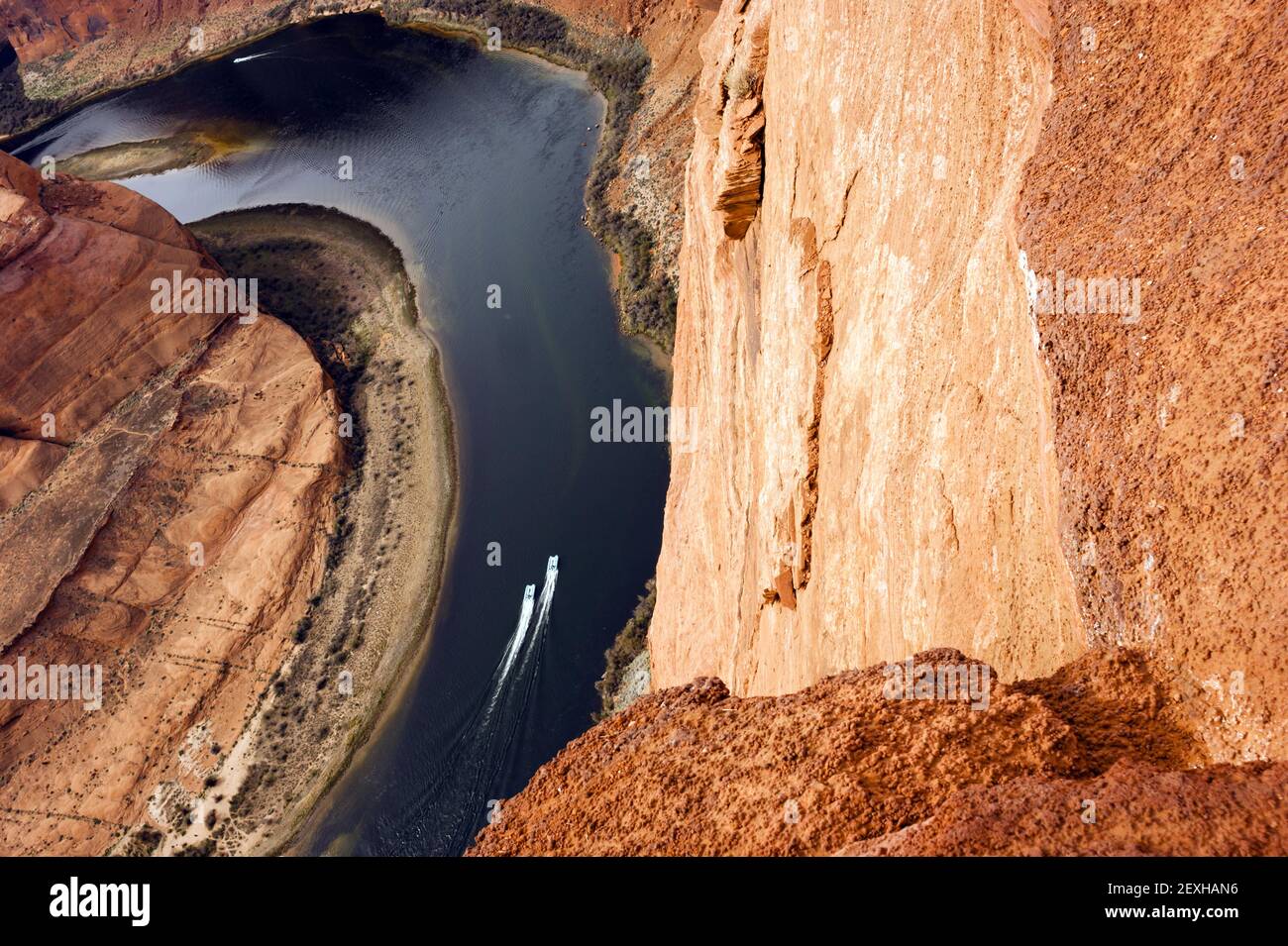 Two Boats Navigate Colorado River Deep Canyon Horseshoe Bend Southwest