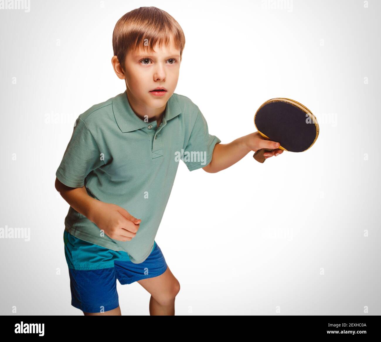 Boy blond man playing table tennis forehand takes topspin emotio Stock  Photo - Alamy