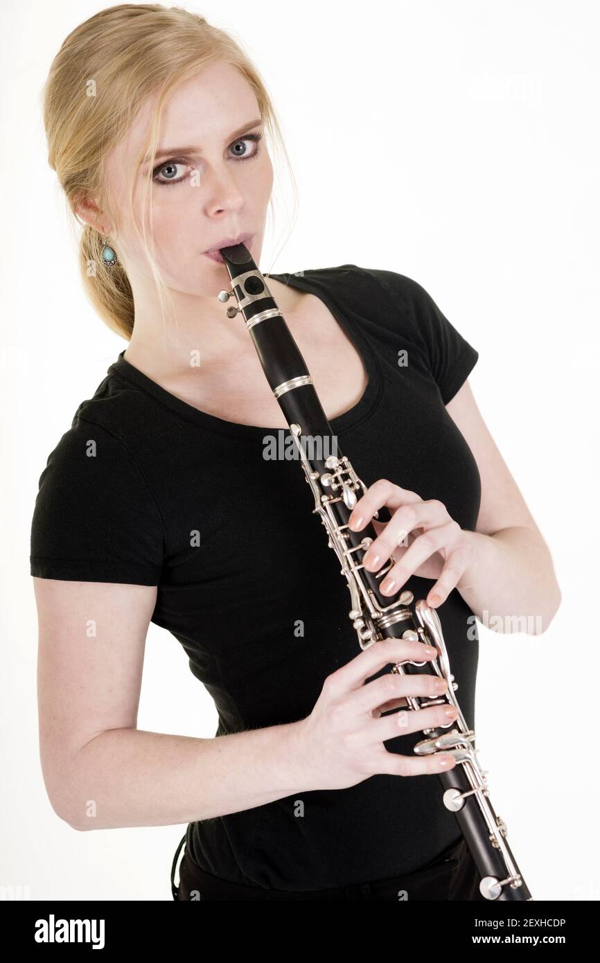 Pretty Blond Woman Playing Clarinet Musical Performance White Background Stock Photo