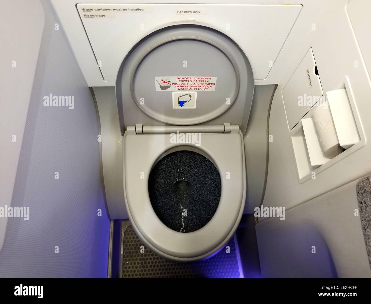 Orlando, Florida, U.S - February 21, 2021 - A toilet inside a plane Stock Photo