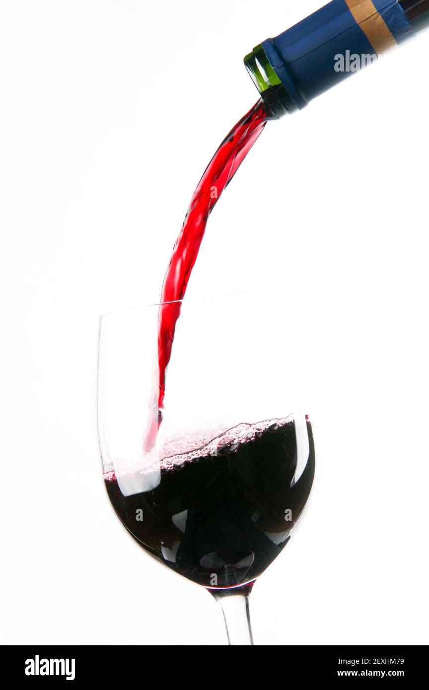Red Burgundy Wine Pour Bottle Neck to Filled Glass Stock Photo