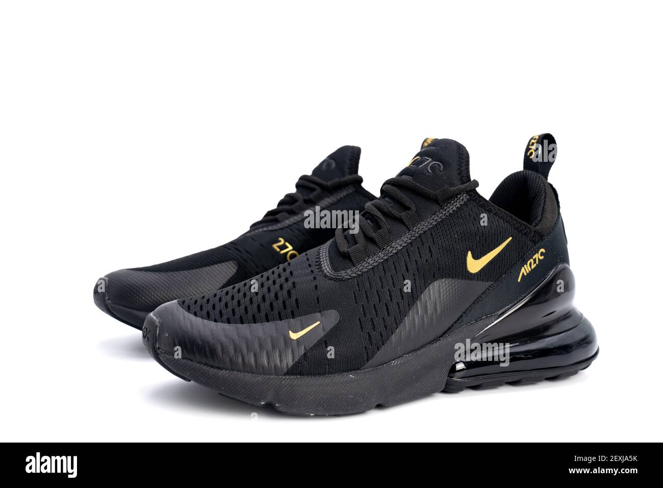 adolescente Novelista Napier Bangkok, Thailand - 23 Mar 2020, Nike air max 270 black and gold adult's  sport shoes, sneakers, trainers detailed close up shot on studio light  white Stock Photo - Alamy