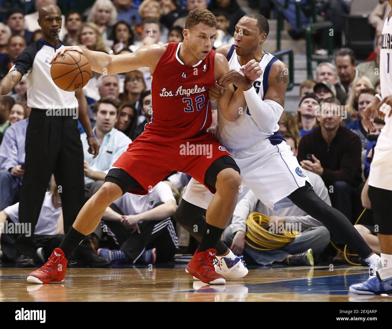 Los Angeles Clippers power forward Blake Griffin (32) drives against Dallas Mavericks small forward Shawn Marion (0) during the game at the American Airlines Center in Dallas, Friday, Jan. 3, 2014. The Clippers beat the Mavericks, 119-112. (Photo by Jim Cowsert/Fort Worth Star-Telegram/MCT/Sipa USA) Stock Photo