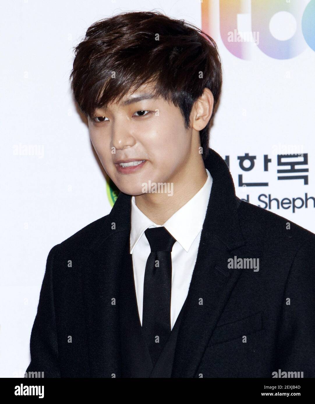 16 January 2014 - Seoul, South Korea : South Korean Kang Min-Hyuk, member  of boys band CNBLUE attend a photo call for the 28th Golden Disk Award at  Kyunghee University Grand Peace, image size:1082x1390