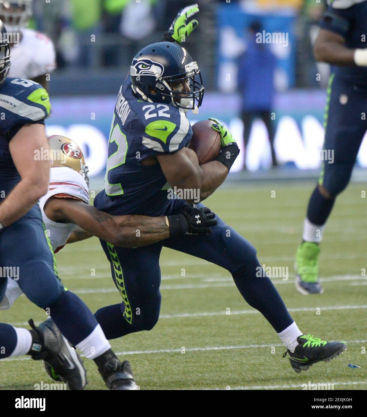 Seattle Seahawks running back, Robert Turbin (22) shows off his NFC Champion  t-shirt following the Seahawaks win over the San Francisco 49ers during the  NFC Championship Game at Centurylink Field in Seattle