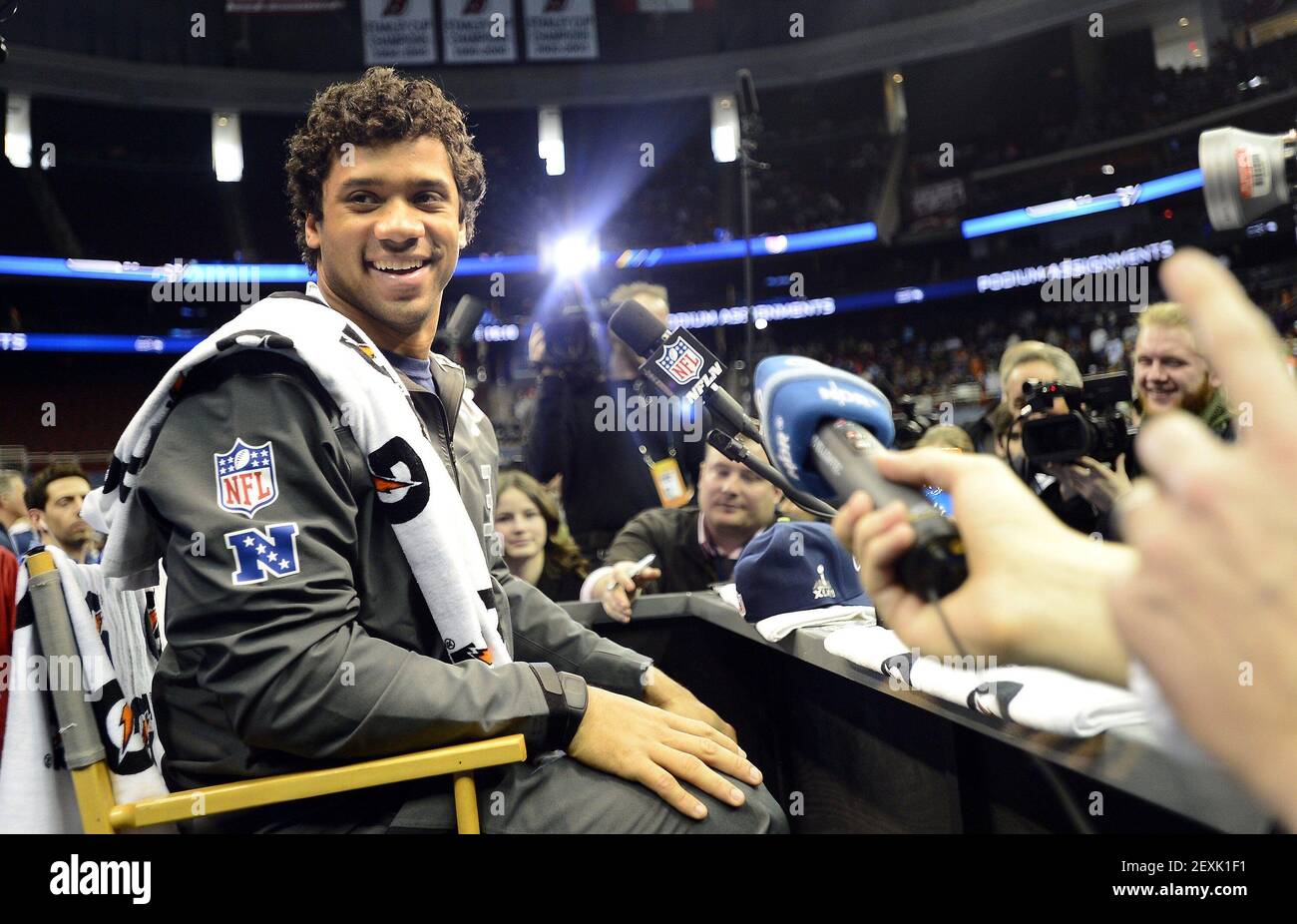 NEWARK, NJ - JANUARY 28: Russell Wilson speaks to the media during