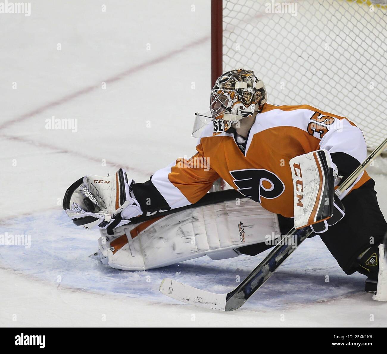 Philadelphia Flyers goalie Steve Mason stops a shot against the Detroit Red  Wings during the third period at the Wells Fargo Center in Philadelphia on  Tuesday, Jan. 28, 2014. The Flyers won,