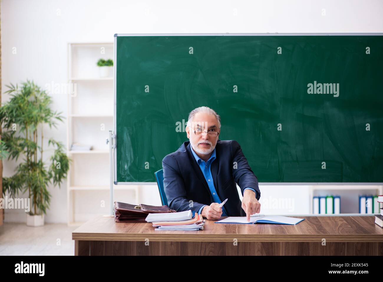 Old Math Professor Elderly math teacher hi-res stock photography and images - Alamy