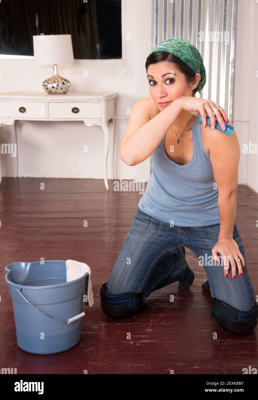 Adorable Housewife Maid Doing Cleaning Chores Scrubbing Floor Hands Knees Stock Photo Alamy