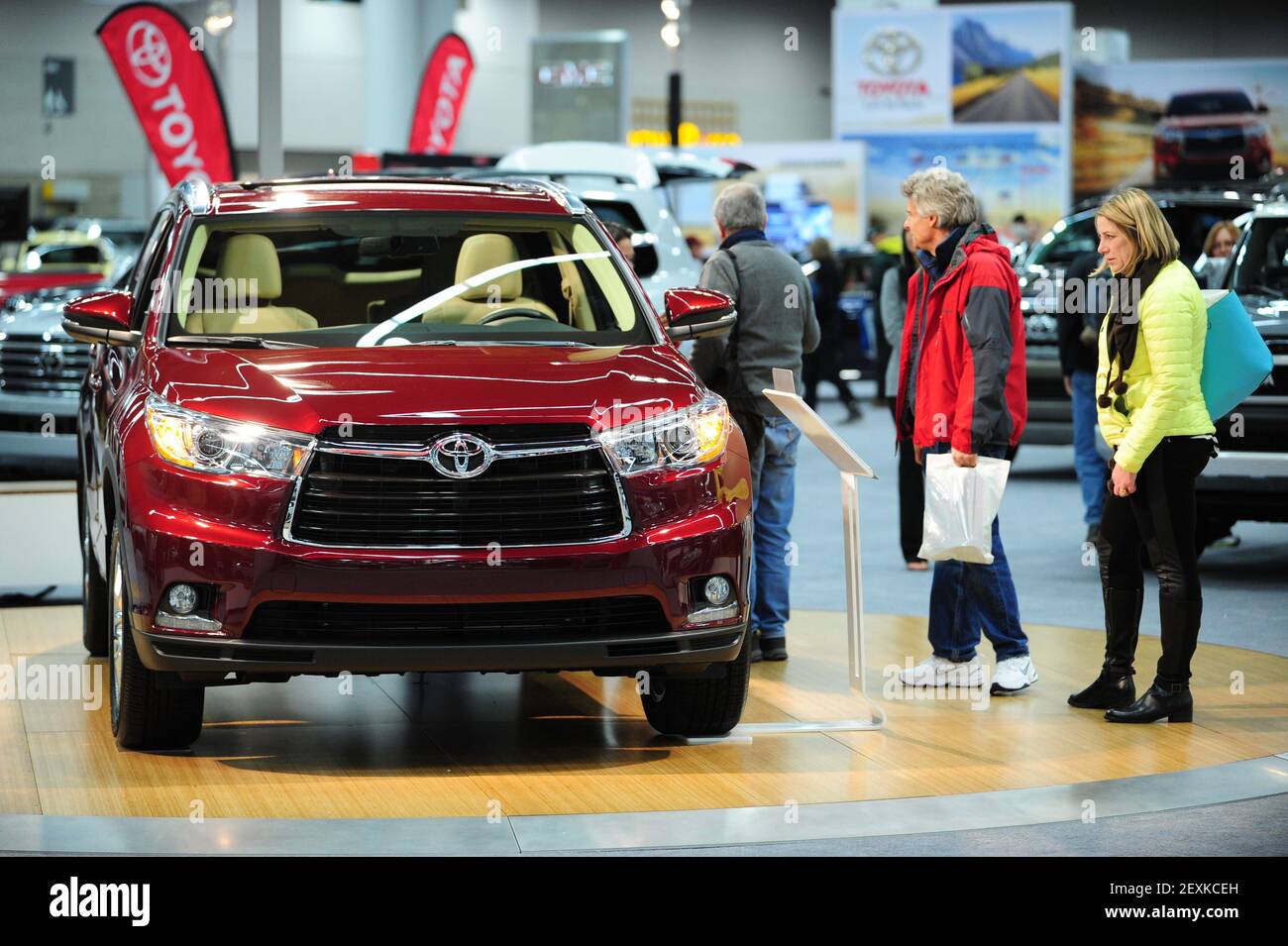 The annual Portland International Auto Show opened today at the Oregon  Convention Center. The four day event began in 1910 and draws more than  100,000 visitors. In photo: People examine the 2014