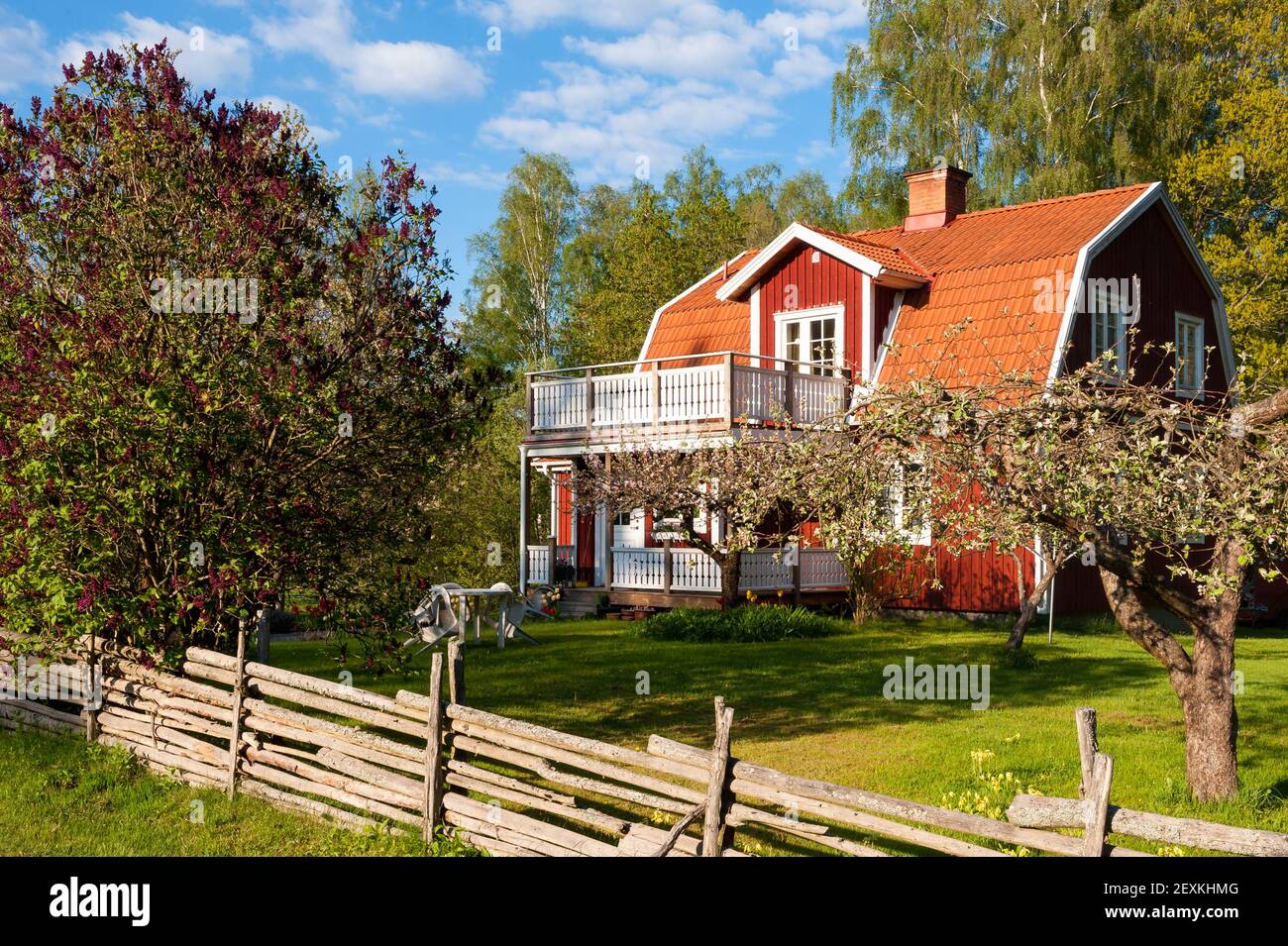 Red wooden house in Sweden Stock Photo - Alamy