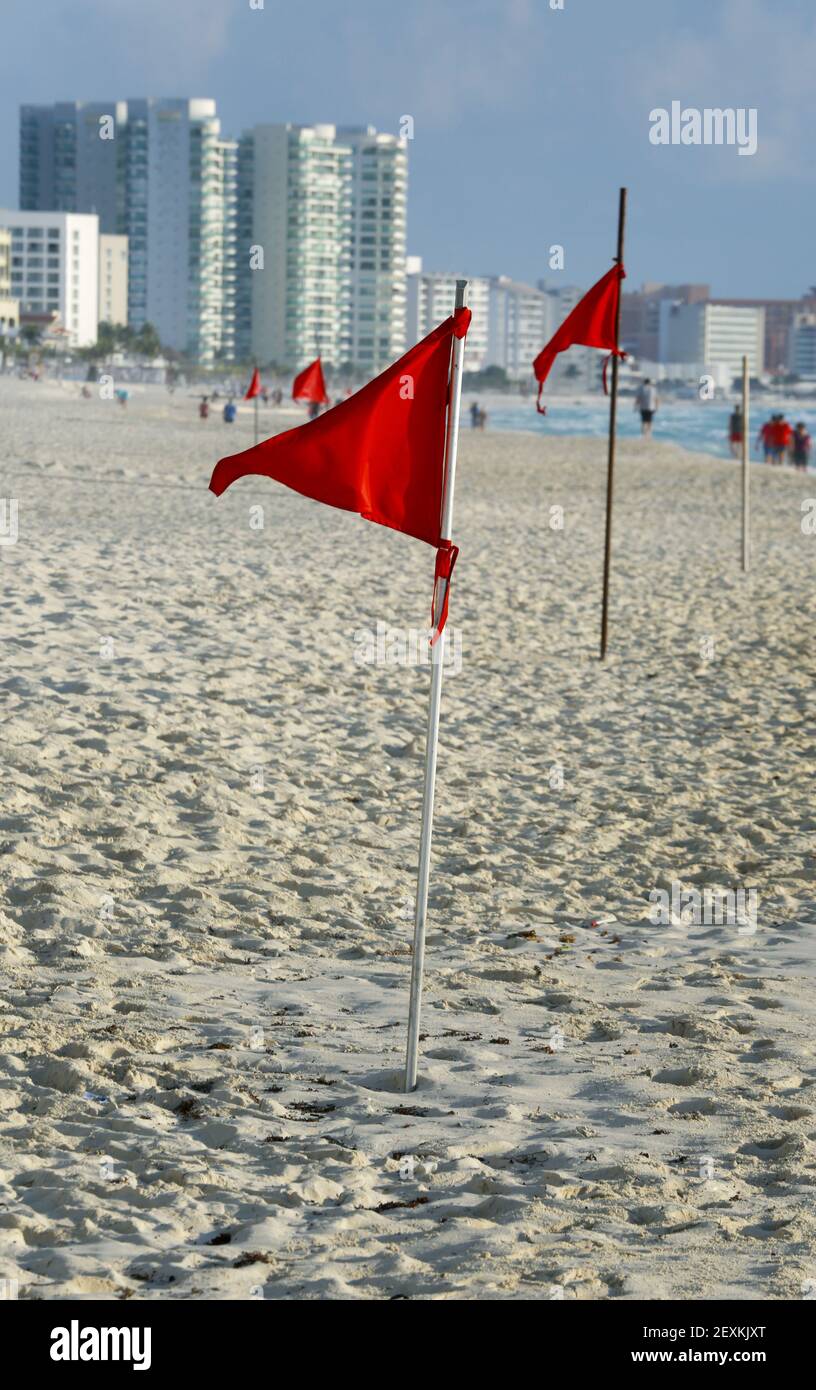 10 Feb 2014. Cancun, Mexico. Red surf flags warn of heavy surf