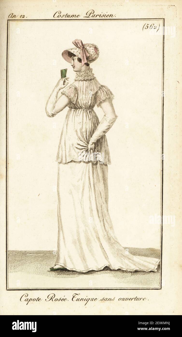 Woman in hooded cap, white muslin dress with tunic overdress. Capote Rosee, Tunique sans ouverture. Handcoloured copperplate engraving from Pierre de la Mesangere’s Journal des Dames et des Modes, Magazine of Women and Fashion, Paris, An 12, July 1804. Illustrations by Carle Vernet, Jean-Francois Bosio, Dominique Bosio and Philibert Louis Debucourt, engraved by Pierre-Charles Baquoy. Stock Photo