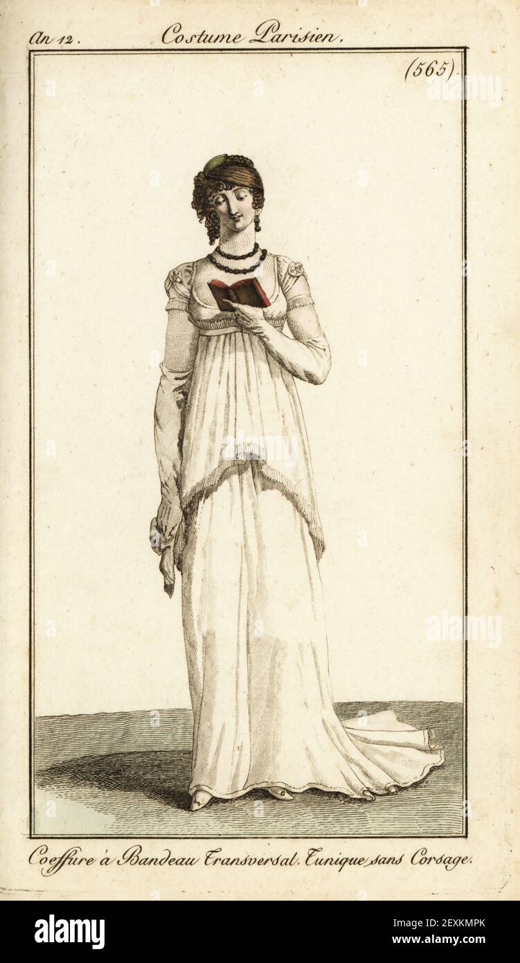 Woman reading an almanac. She wears her curly hair tied with a bandana, tunic dress with no bodice. Coeffure a Bandeau Transversal, Tunique sans Corsage. Handcoloured copperplate engraving from Pierre de la Mesangere’s Journal des Dames et des Modes, Magazine of Women and Fashion, Paris, An 12, July 1804. Illustrations by Carle Vernet, Jean-Francois Bosio, Dominique Bosio and Philibert Louis Debucourt, engraved by Pierre-Charles Baquoy. Stock Photo