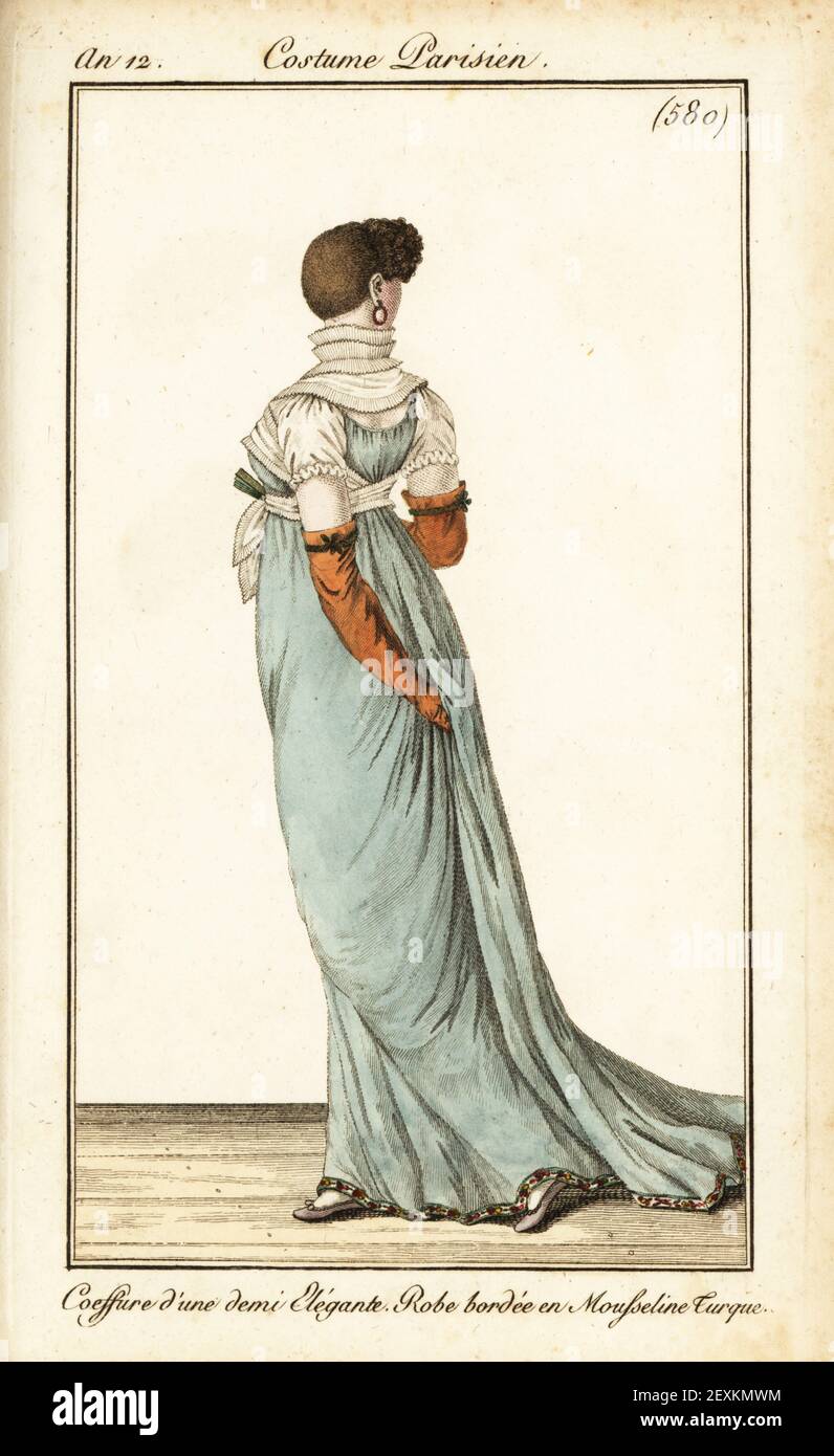 Rear view of woman with very short hair, curls at the front, funnel collar, and dress bordered with Turkish muslin. Coeffure d'une demi Elegante, robe bordee en mousseline Turque, Colerette en Entonnoir. Handcoloured copperplate engraving from Pierre de la Mesangere’s Journal des Dames et des Modes, Magazine of Women and Fashion, Paris, An 12, September 1804. Illustrations by Carle Vernet, Jean-Francois Bosio, Dominique Bosio and Philibert Louis Debucourt, engraved by Pierre-Charles Baquoy. Stock Photo