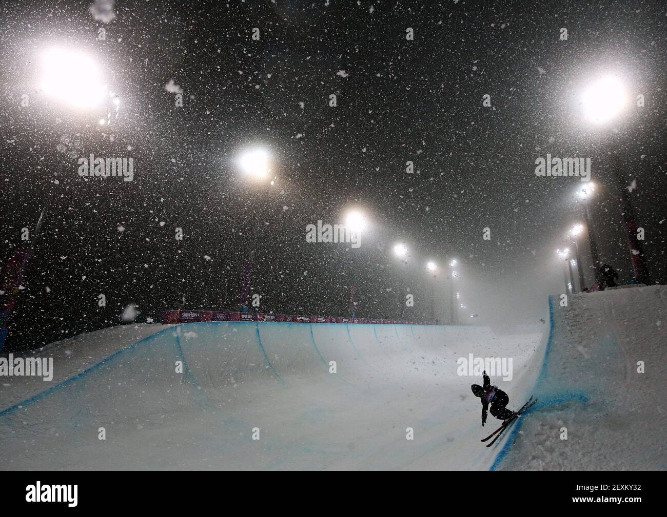 Skiers warm up in heavy snow for the finals of the men's ski halfpipe at Rosa Khutor Extreme Park during the Winter Olympics in Sochi, Russia, Tuesday, Feb. 18, 2014. (Photo by Brian Cassella/Chicago Tribune/MCT/Sipa USA) Stock Photo