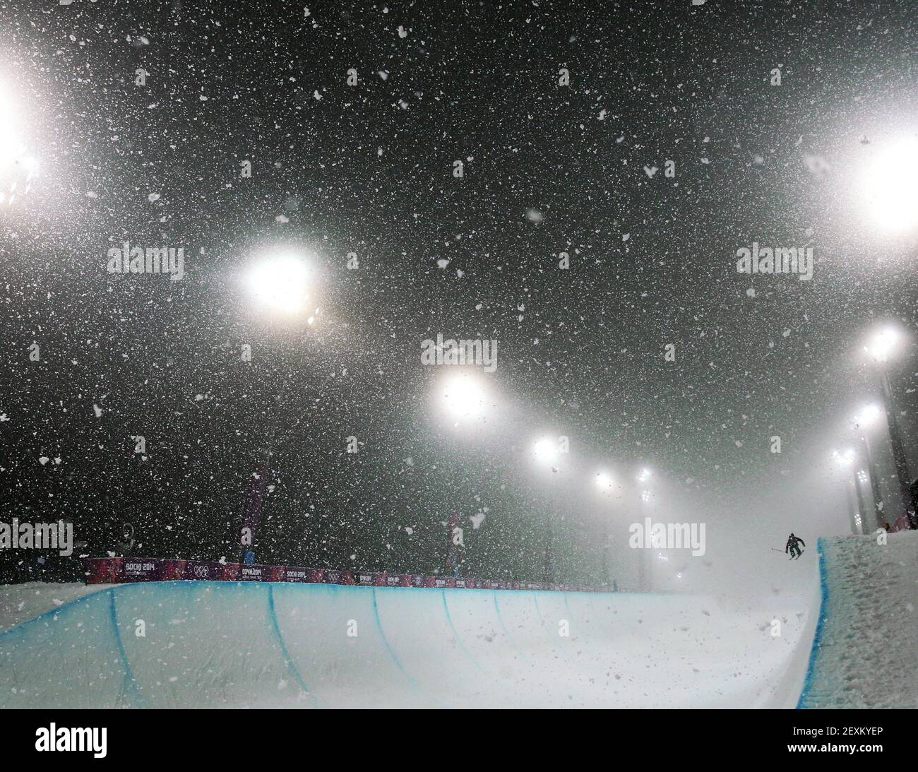 Competitors warm up in heavy snow for the finals of the men's ski halfpipe at Rosa Khutor Extreme Park during the Winter Olympics in Sochi, Russia, Tuesday, Feb. 18, 2014. (Photo by Brian Cassella/Chicago Tribune/MCT/Sipa USA) Stock Photo