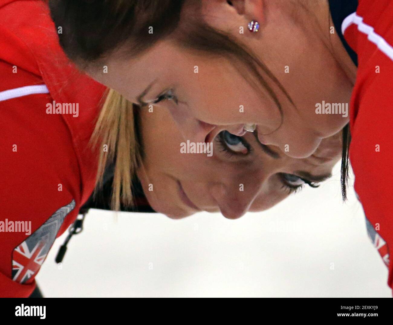 Great Britain's Anna Sloan (below) and Vicki Adams play during women's curling semifinals at the Ice Cube Curling Center during the Winter Olympics in Sochi, Russia, Wednesday, Feb. 19, 2014. (Photo by Brian Cassella/Chicago Tribune/MCT/Sipa USA) Stock Photo