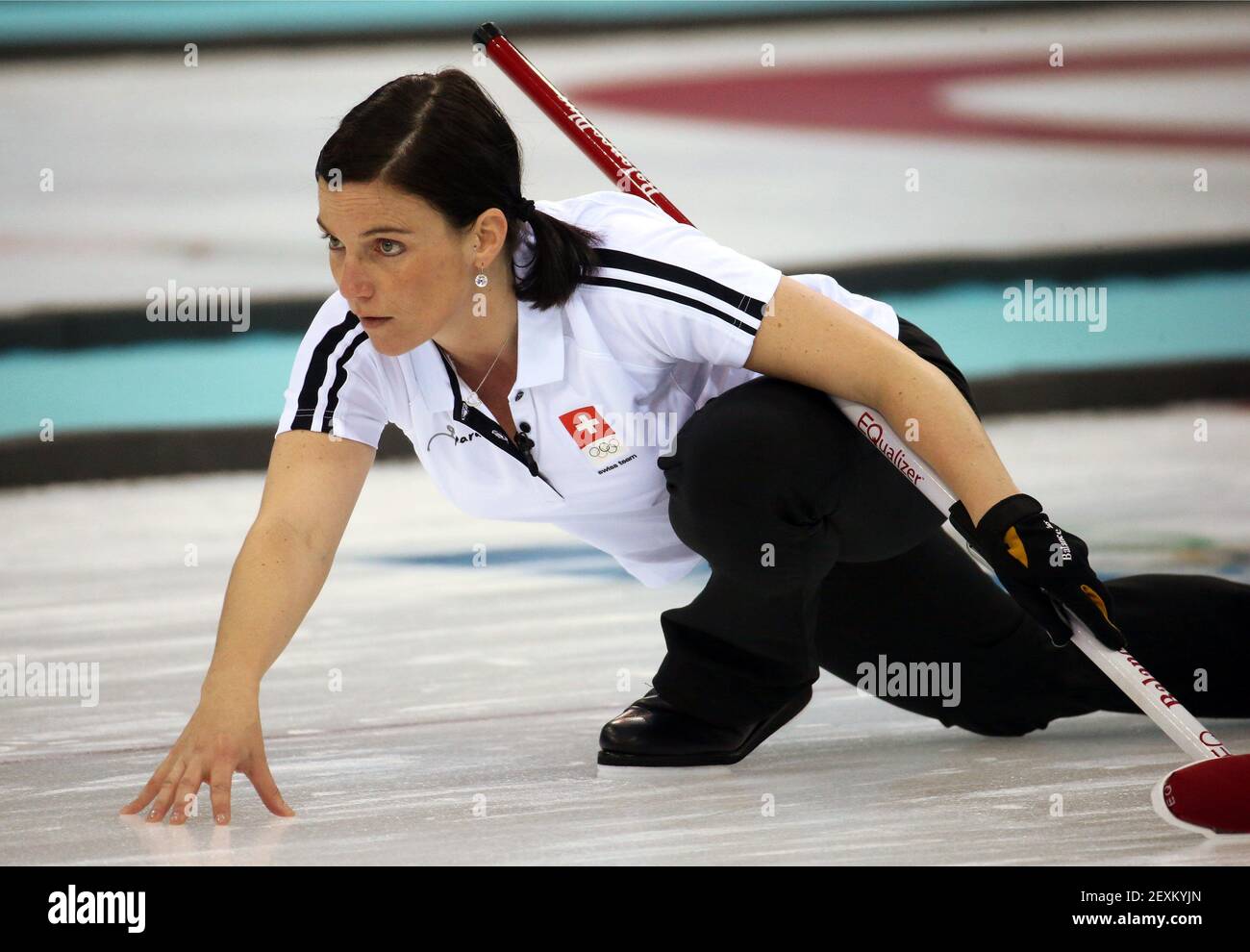 Switzerland's Carmen Kueng watches a throw during women's curling semifinals at the Ice Cube Curling Center during the Winter Olympics in Sochi, Russia, Wednesday, Feb. 19, 2014. (Photo by Brian Cassella/Chicago Tribune/MCT/Sipa USA) Stock Photo