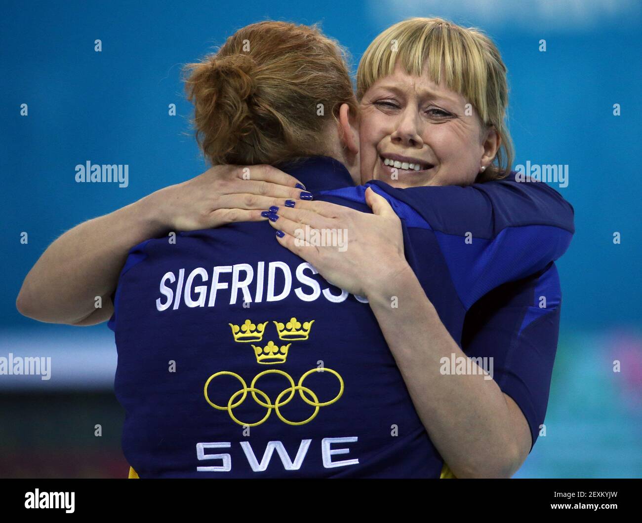 Sweden's Margaretha Sigfriedsson (left) and Maria Prytz celebrate their victory over Switzerland during women's curling semifinals at the Ice Cube Curling Center during the Winter Olympics in Sochi, Russia, Wednesday, Feb. 19, 2014. (Photo by Brian Cassella/Chicago Tribune/MCT/Sipa USA) Stock Photo