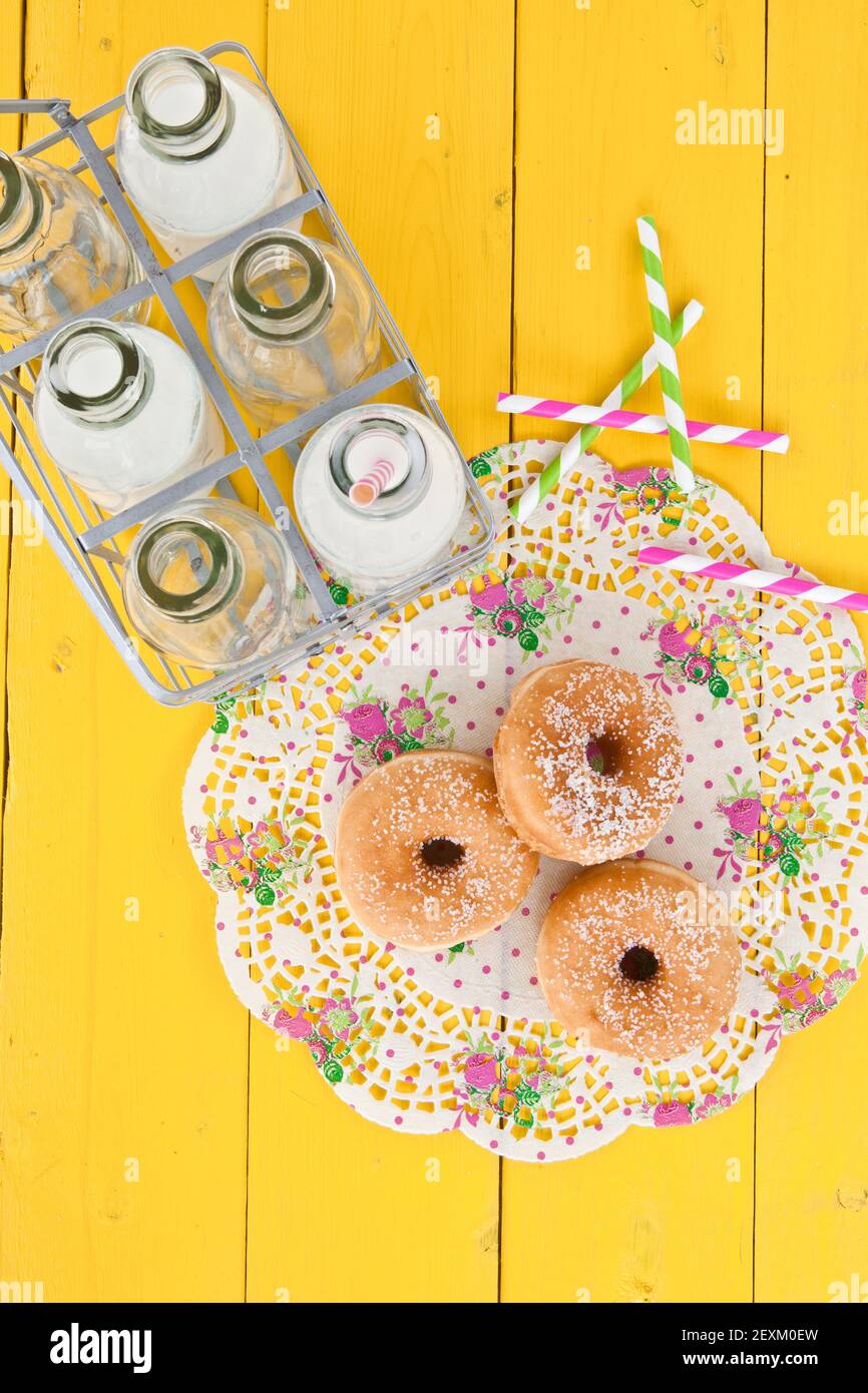 Milk and donuts Stock Photo Alamy