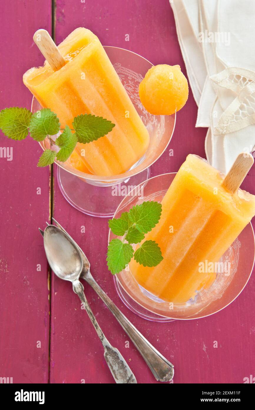 Homemade melon ice cream on a stick Stock Photo Alamy