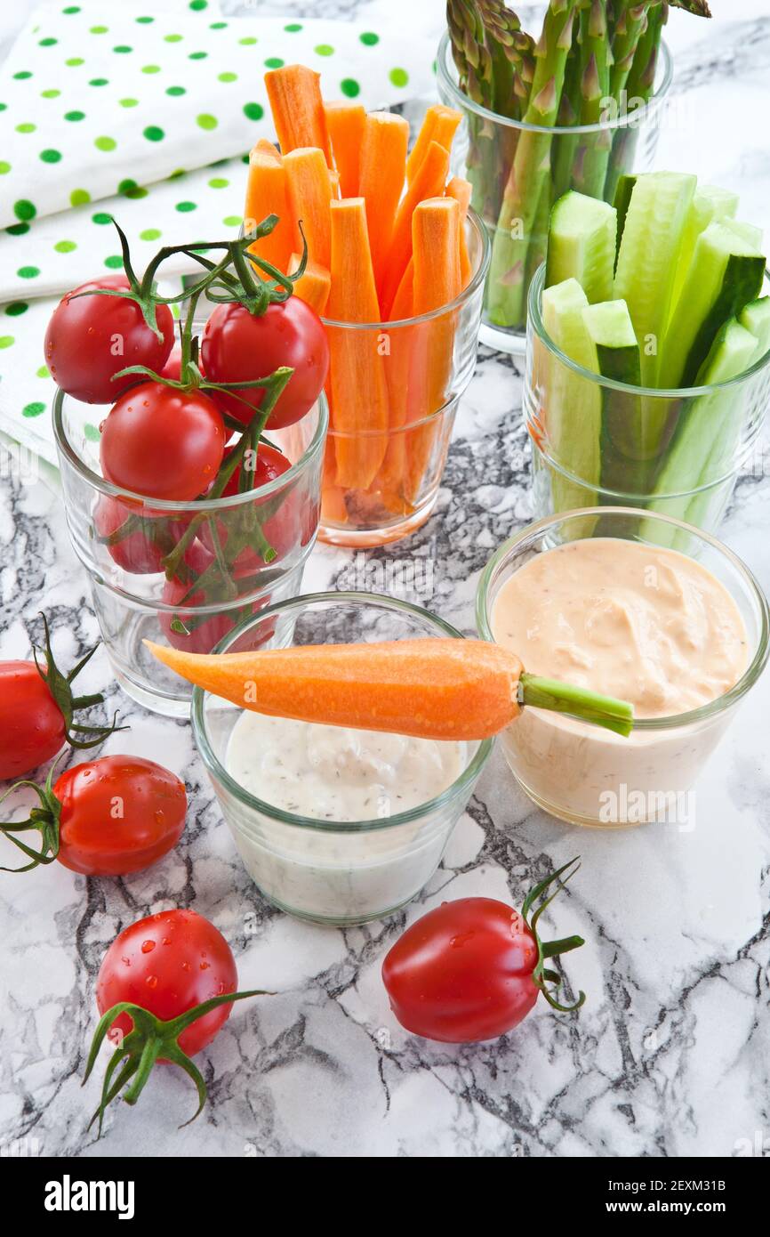 Colourful vegetable sticks with curd cheese Stock Photo Alamy
