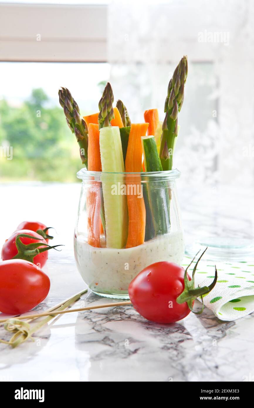 Colourful vegetable sticks with curd cheese Stock Photo Alamy
