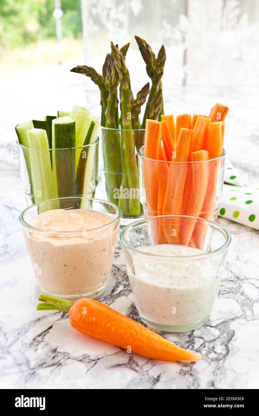 Colourful vegetable sticks with curd cheese Stock Photo Alamy