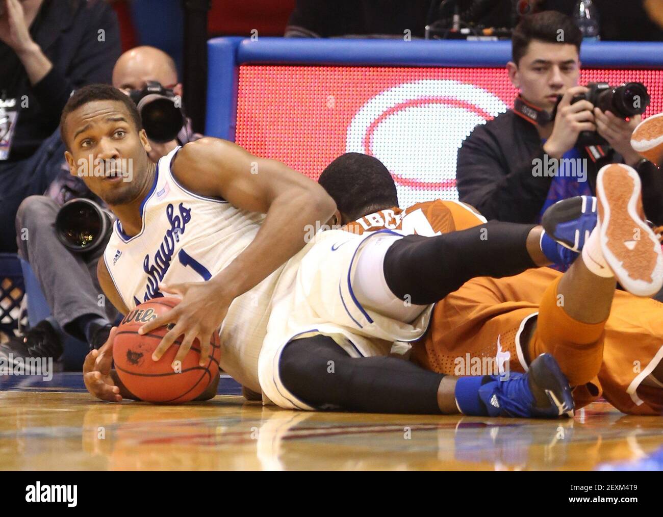 Kansas' Wayne Selden, Jr. (Photo by 1) slides across the floor after