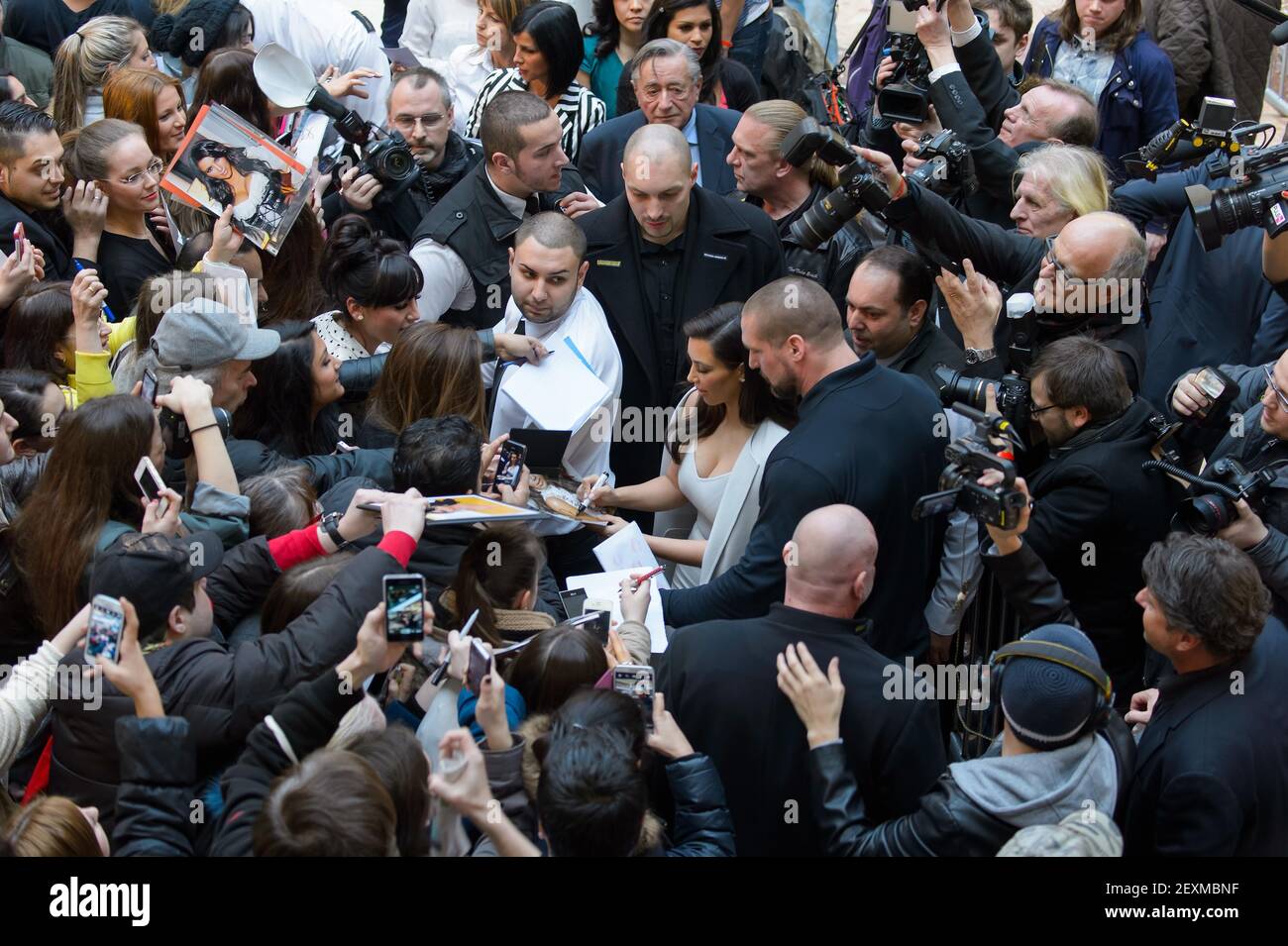 Kim Kardashian attends an autograph session and press conference ahead