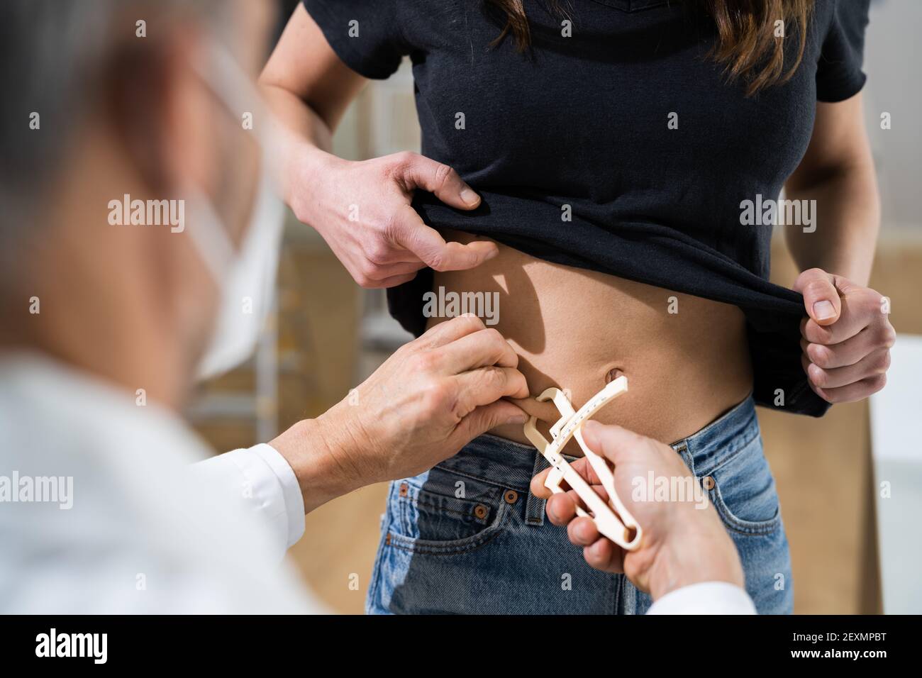 Measure body fat percentage hi-res stock photography and images - Alamy