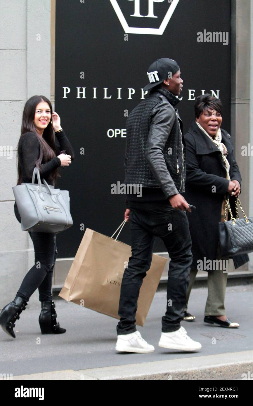 Juventus Soccer Club player Paul Pogba shops with his mother and his  girlfriend at both Versace and Armani Boutique on March 27th, 2014 in  Milan, Italy. (Photo By Massimiliano Botto/Sipa USA Stock