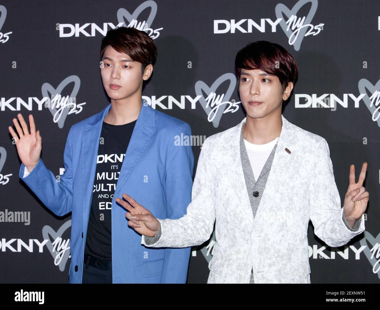 27 March 2014 - Seoul, South Korea : ( R to L) South Korean Jung Yong-Hwa  and Kang Min-Hyuk members of K-Pop boys band CN Blue, attend a photo call  for the, image size:1300x1059